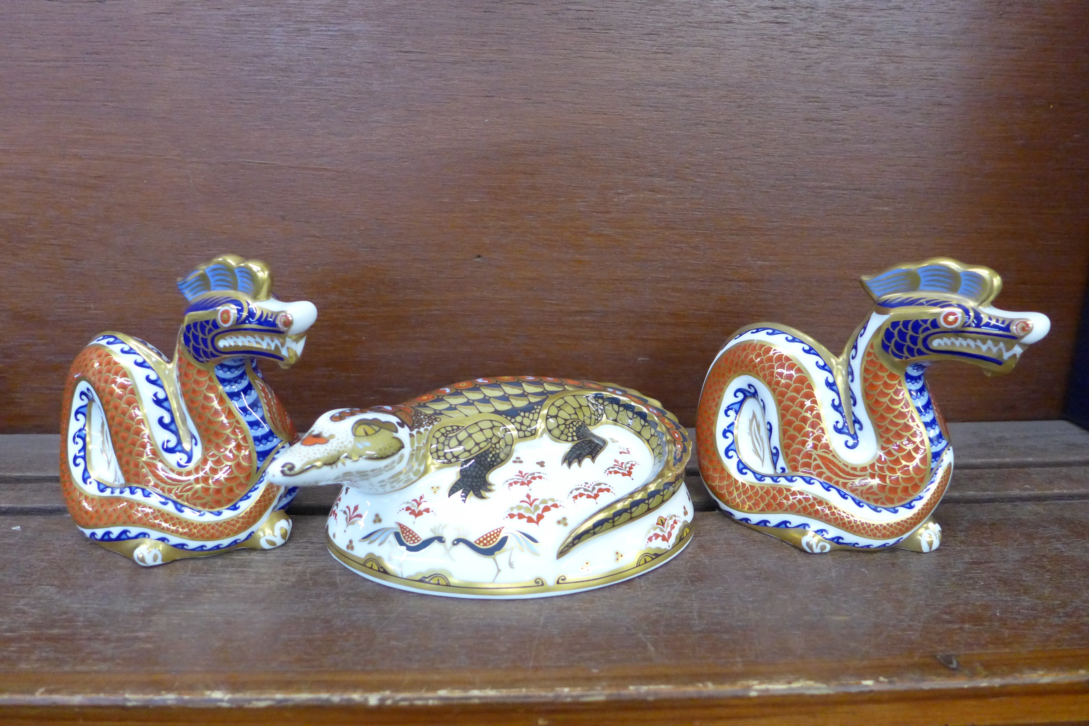 Three Royal Crown Derby paperweights - Crocodile, a gold signature edition commissioned by The Guild