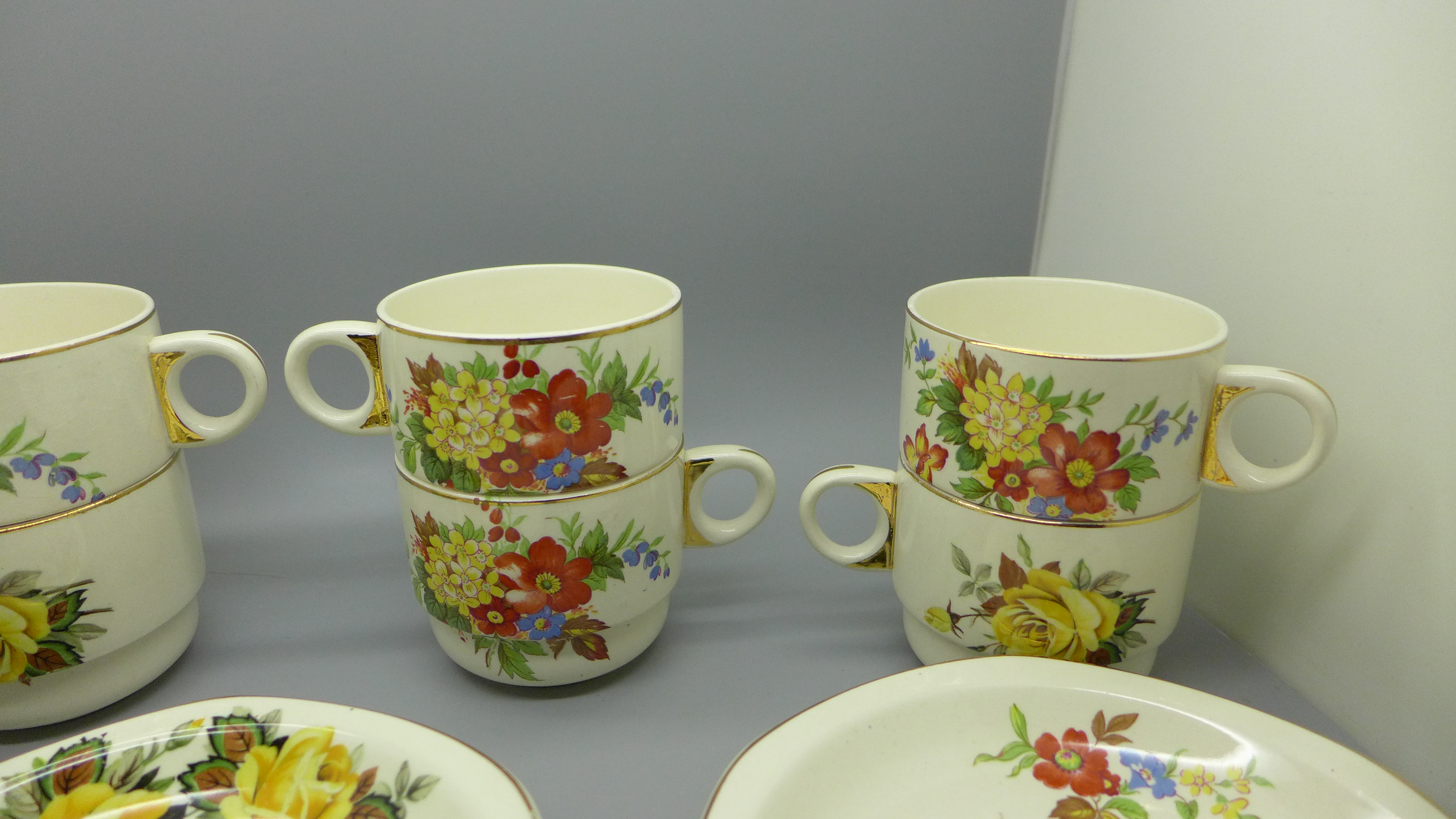 Eight Brexton Pottery cups and saucers decorated with flowers - Image 2 of 4