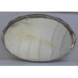 A large oval silver plated gallery tray