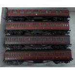 Four Dapol OO gauge railway carriages (maroon)