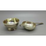 A silver strainer and bowl by Edward Barnard & Sons, London 1945/46, 110g