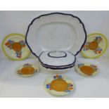 Four Clarice Cliff Crocus pattern plates, a meat plate and tureen