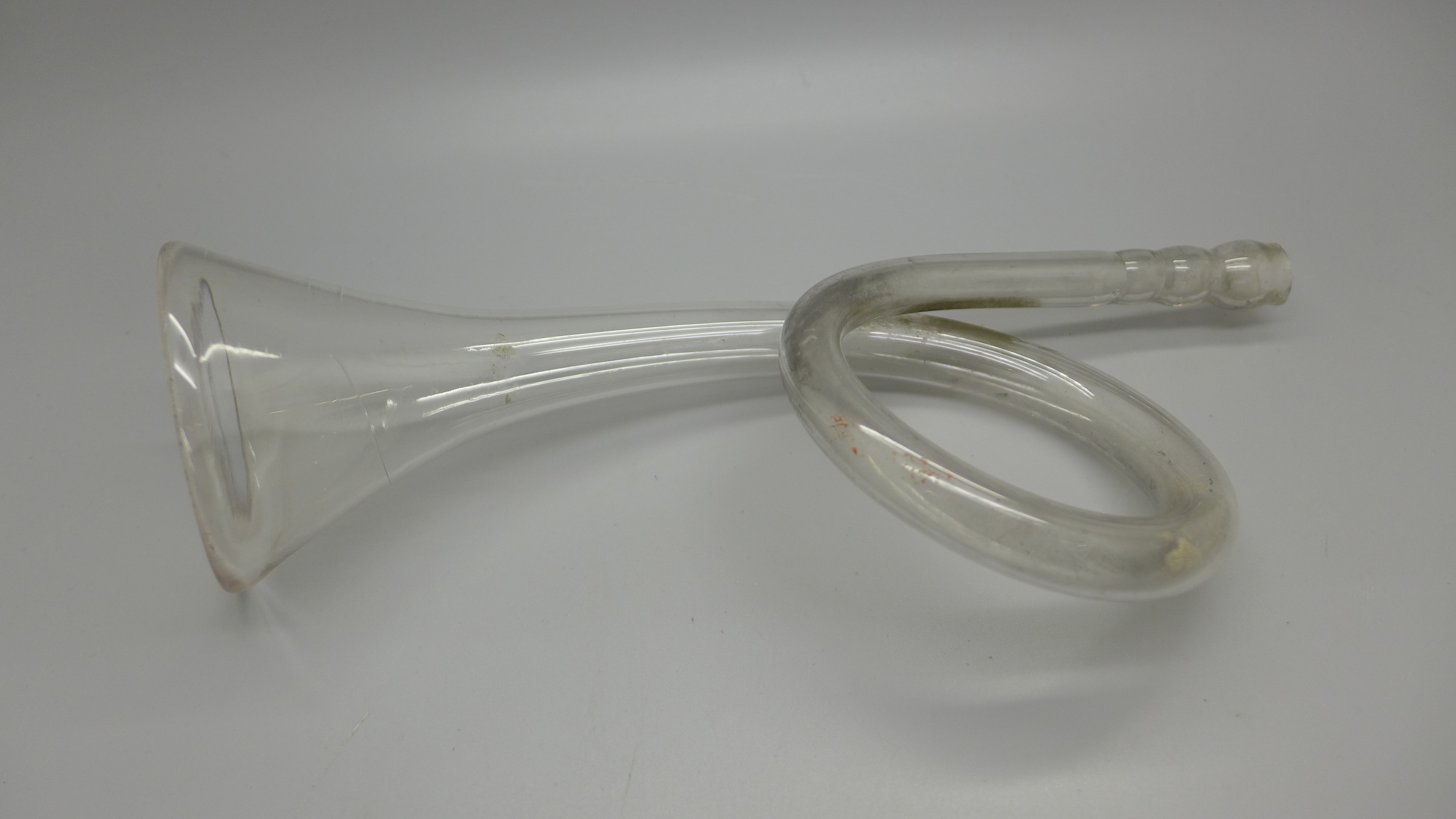 A Georgian glass horn shaped pontil