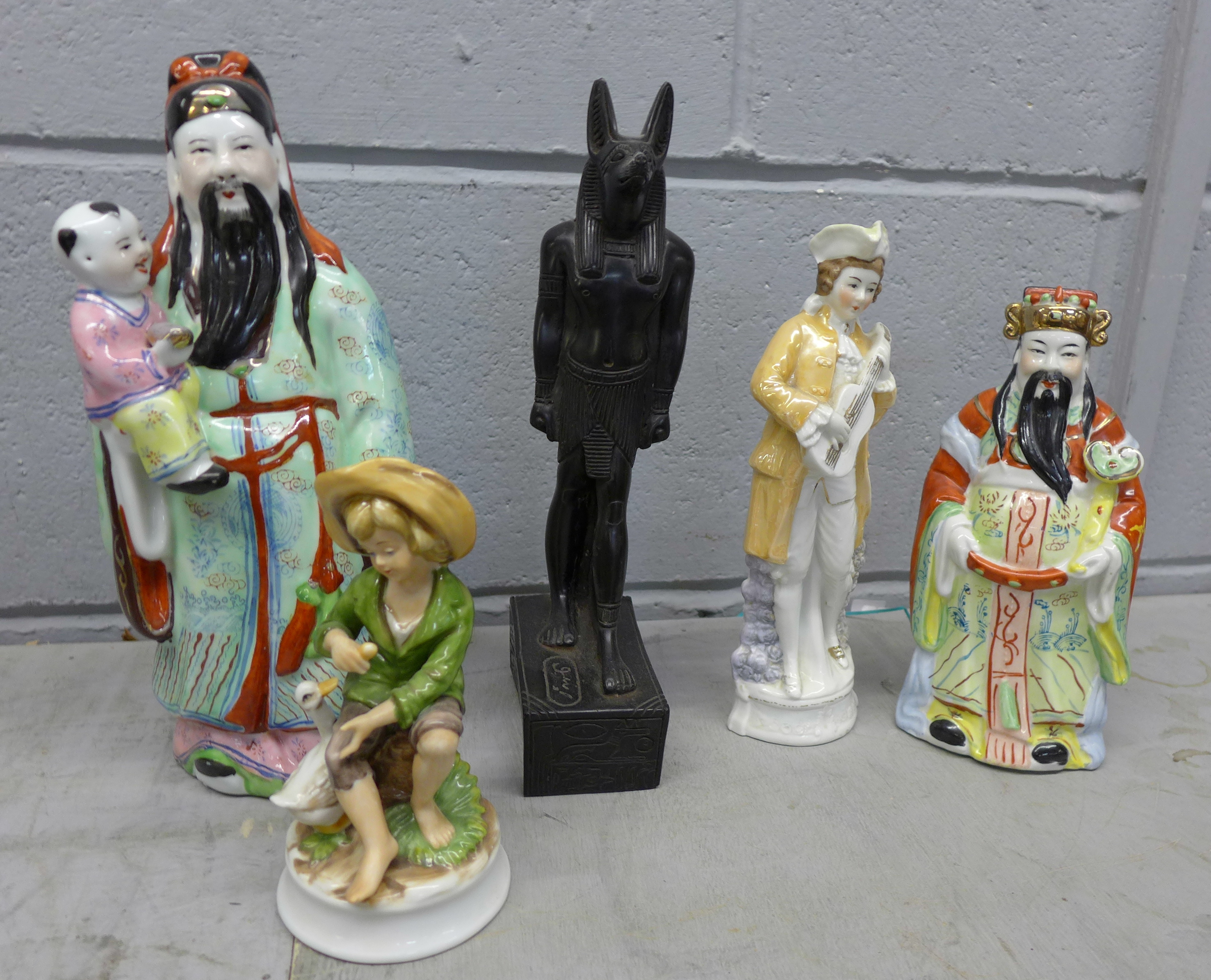 Porcelain figures and a resin Egyptian figure **PLEASE NOTE THIS LOT IS NOT ELIGIBLE FOR POSTING AND