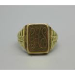 A 14ct gold ring, with initials, marked 585 on the outside of the shank, 7.6g, R