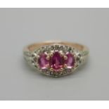 A silver gilt, vintage style amethyst and zircon ring, 2.3g, L
