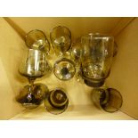 A set of Libbey Tawny smoked glass, five tumblers and seven wine glasses **PLEASE NOTE THIS LOT IS