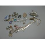 A large silver set quartz pendant, two silver opal set pendants, an owl brooch, a silver locket,