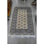 A cream ground rug