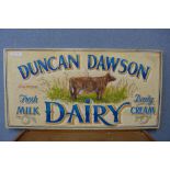 A painted wooden Duncan Dawson Dairy sign
