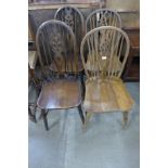 A pair of elm wheelback kitchen chairs and another pair