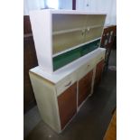 A 1960's Hygena kitchen cabinet and a wall mounted cabinet
