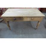 A Victorian pine two drawer farmhouse serving table