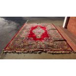 A large red ground rug