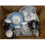 A box of mixed teawares, six black and gold cups and saucers, marked foreign, Colclough and a blue