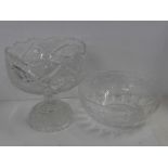 A large glass punch bowl and one other similar on stand