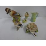 Five items of Royal Worcester; Fledgling Robin, Fledgling bullfinch, Jay, Camellia and a jug