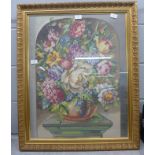 A large gilt framed embroidery of flowers in a vase