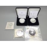 Five coins, The 50th Anniversary of The Moon Landing Solid Silver Proof £5 coin and The Royal Mint
