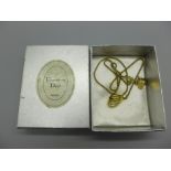 A vintage Christian Dior pendant and chain