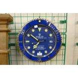 A Rolex dealer's display wall clock