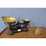 A set of vintage Libra kitchen scales and brass weights