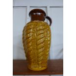 A large West German ochre and brown glazed porcelain vase