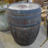 A large coopered oak wine barrel