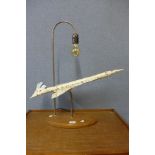 A Concorde table lamp