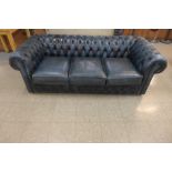 A blue leather Chesterfield settee