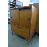 A teak record cabinet