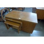 A McIntosh Tristor teak fold over cabinet/table