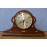 An Art Nouveau inlaid mahogany mantel clock