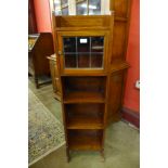 A Liberty & Co. Arts and Crafts inlaid mahogany open bookcase