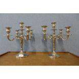 A pair of four stainless steel branch candelabra, retailed by John Lewis