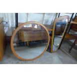 Two teak framed mirrors