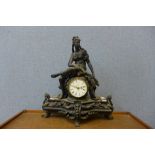 An Art Nouveau style figural resin mantel clock