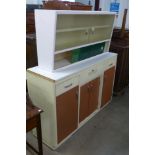 A 1960's Hygena kitchen cabinet and a wall mounted cabinet