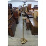 An early 20th Century telescopic brass floor standard lamp