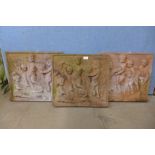 Three terracotta relief cherub plaques