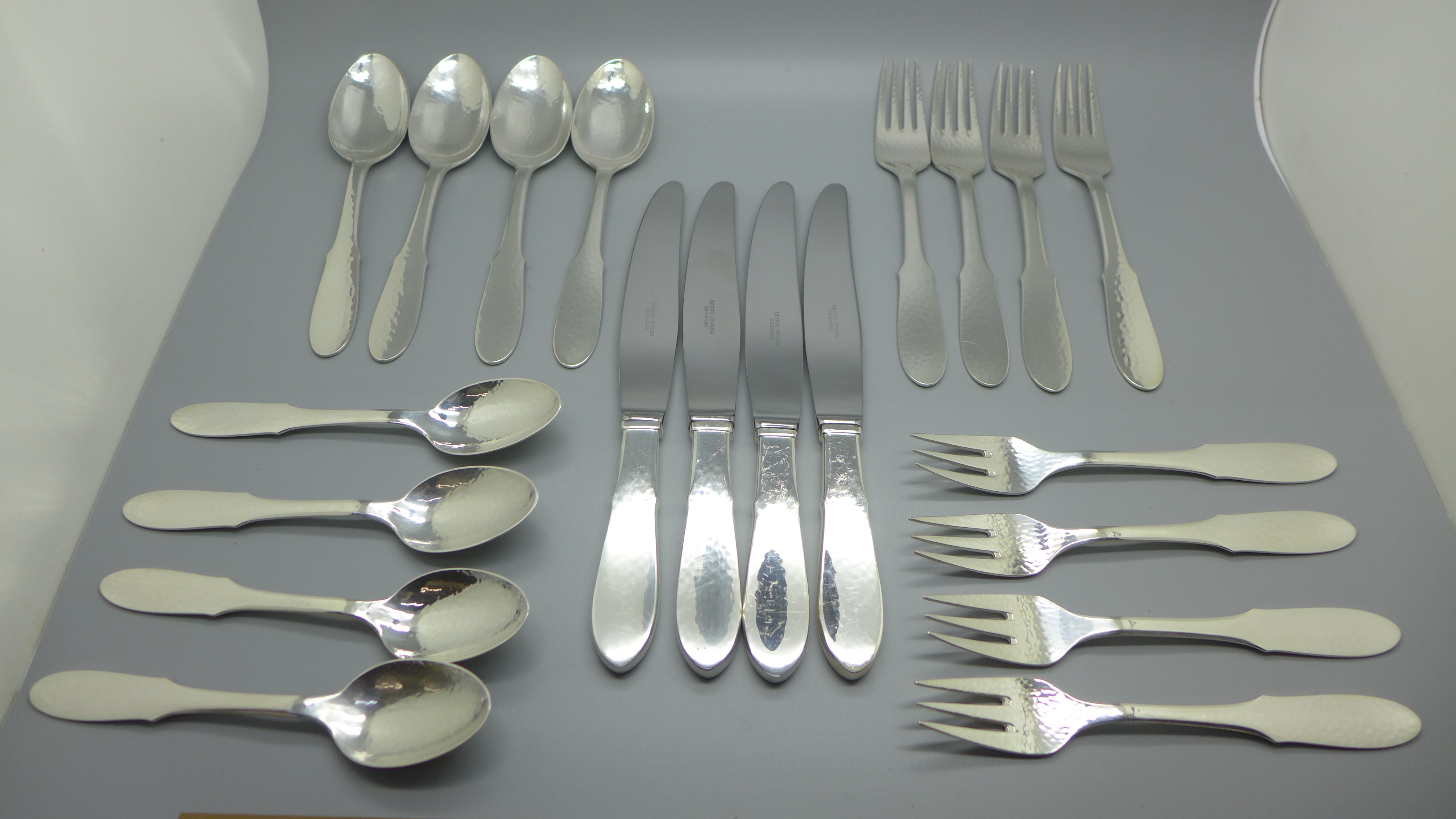 Four Georg Jensen silver plate Mermaid five piece flatware sets, dinner knife, dinner fork, salad