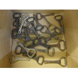 Twenty assorted branded metallic bottle openers