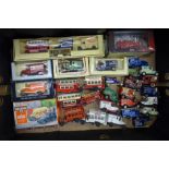 A box of die-cast model vehicles, mainly Days Gone