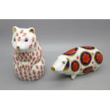 Two Royal Crown Derby paperweights comprising a hamster and pig