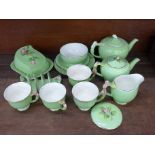 Royal Winton Green Rosebud part tea set, butter dish, four cups, two saucers and side plates,