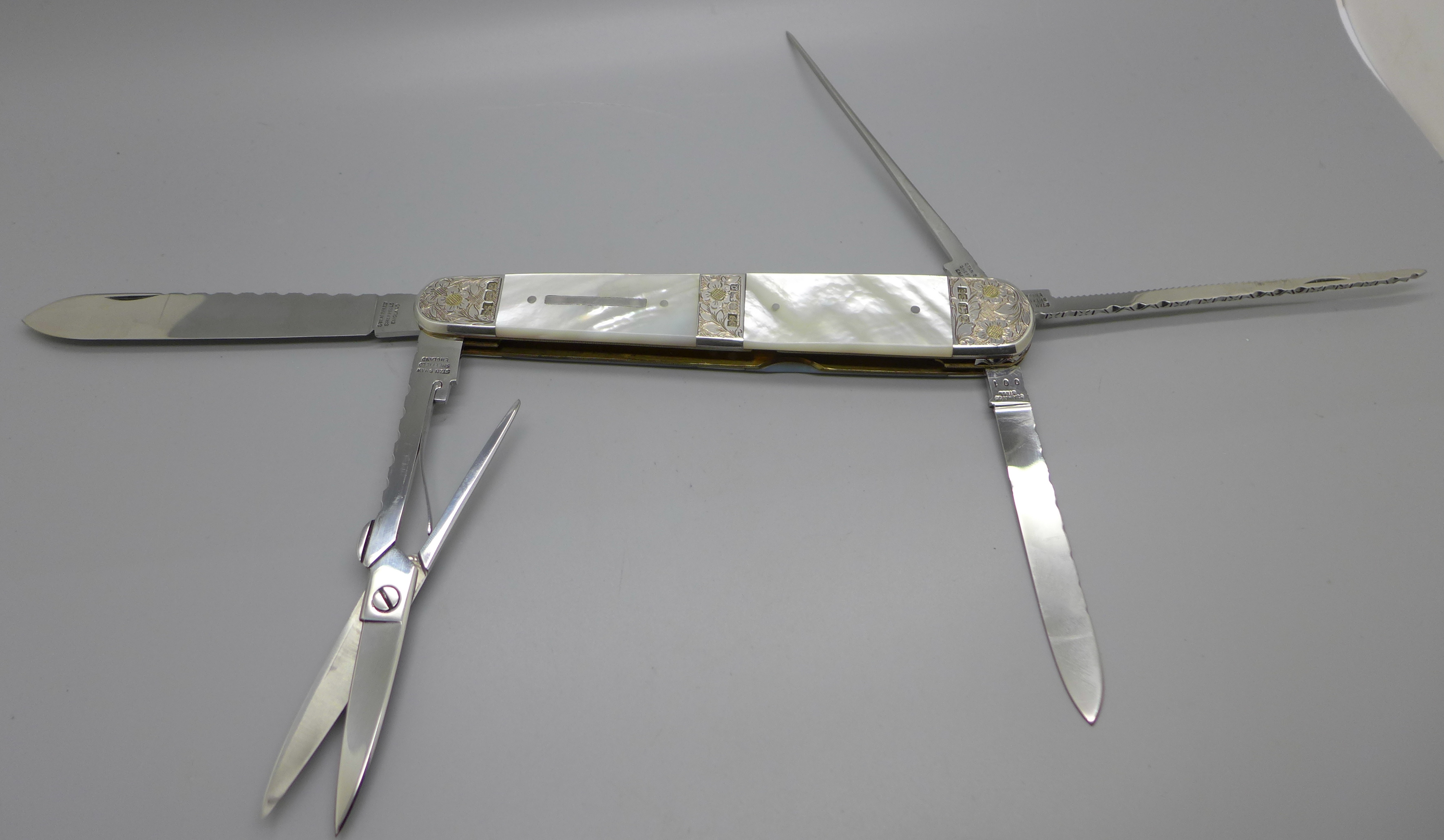 A Stan Shaw ceremonial silver mounted and mother of pearl 7" pocket knife, Sheffield 1990