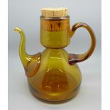 A 1970's Spanish amber glass jug with stopper