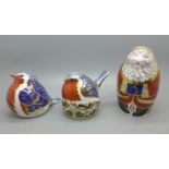 Three Festive Royal Crown Derby Paperweights - Santa Claus in the form of a Russian doll, red robe