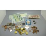 A collection of coins and banknotes