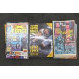 A collection of comics including X-Force, Team X, Silver Surfer, etc., and The Comic Book